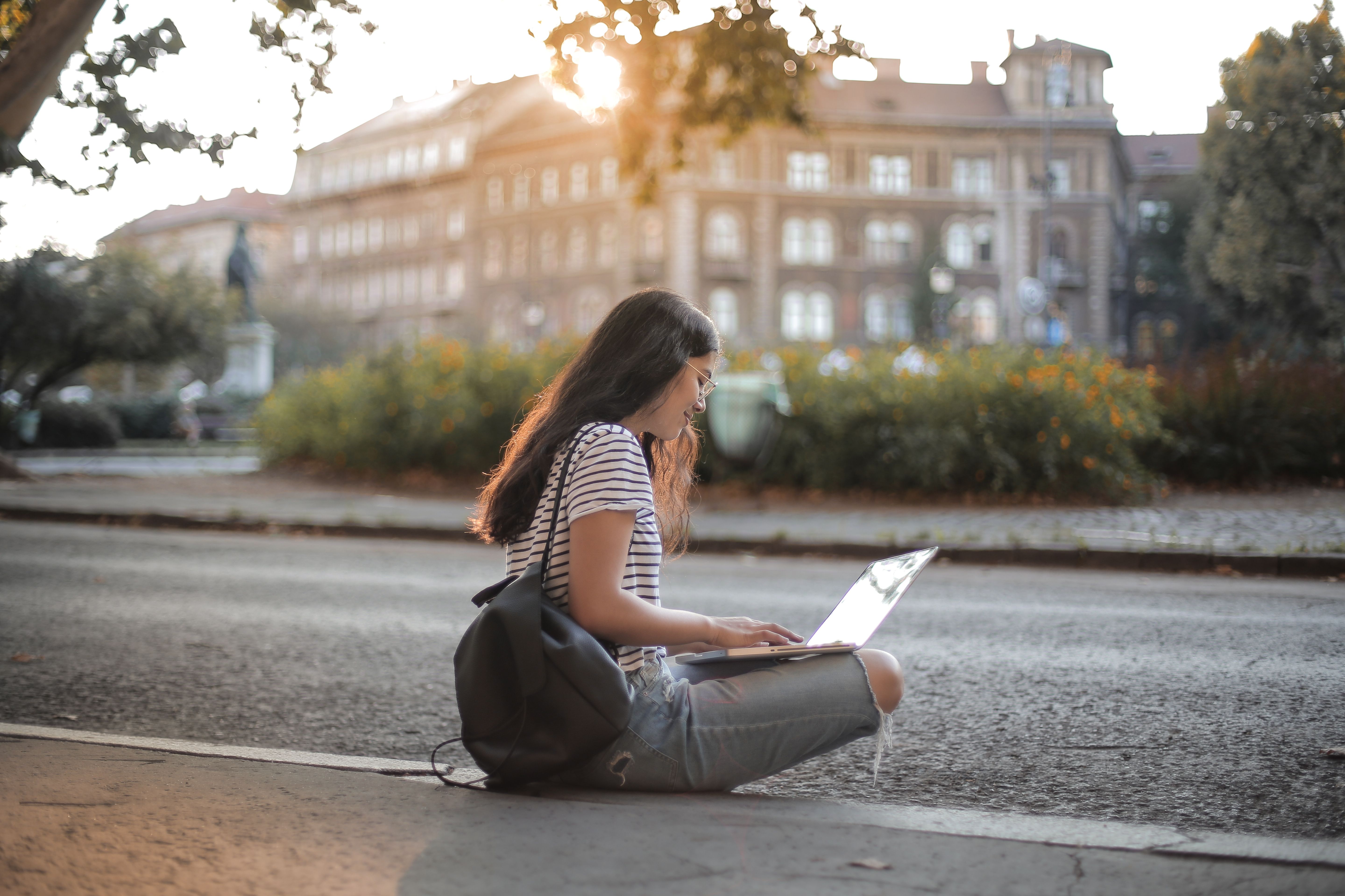 Remote professional working outdoors