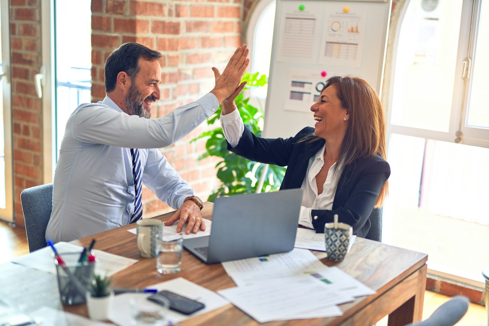 Professionals collaborating in a modern workspace
